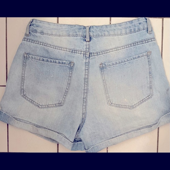 Folded distressed shorts - Picture 2 of 3